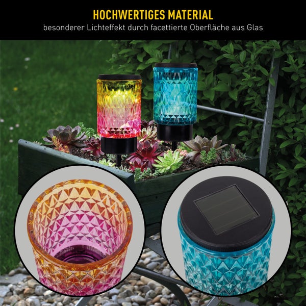 Zwei Solarleuchten aus Glas mit facettierter Oberfläche im Blumenkasten