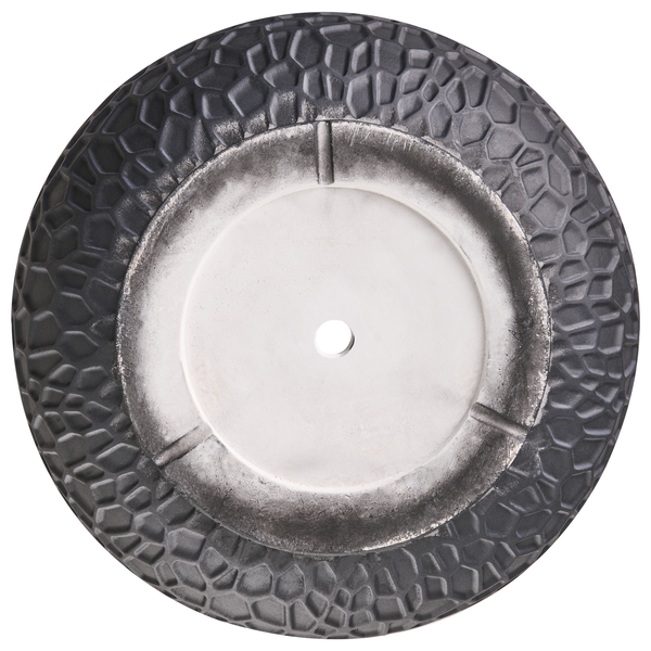 Unterseite eines Pflanzgefäßes aus Keramik mit Abflussloch