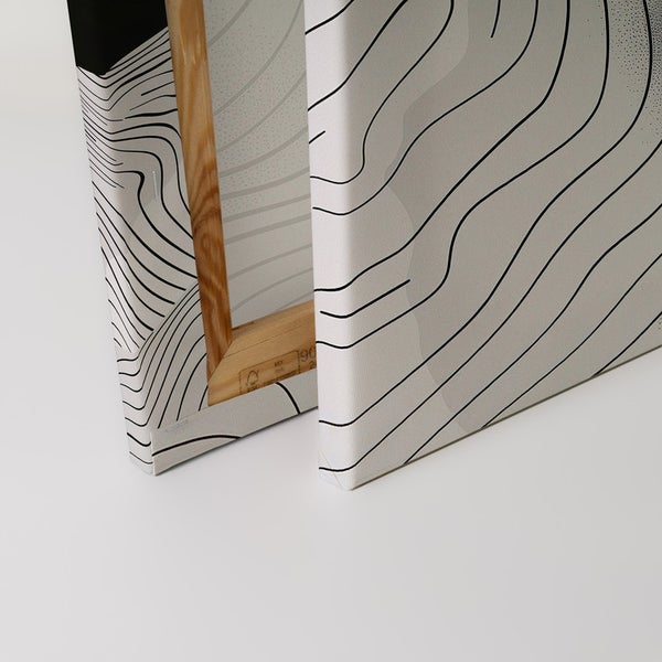 Detailansicht einer Leinwand mit abstraktem Design und Holzrahmen