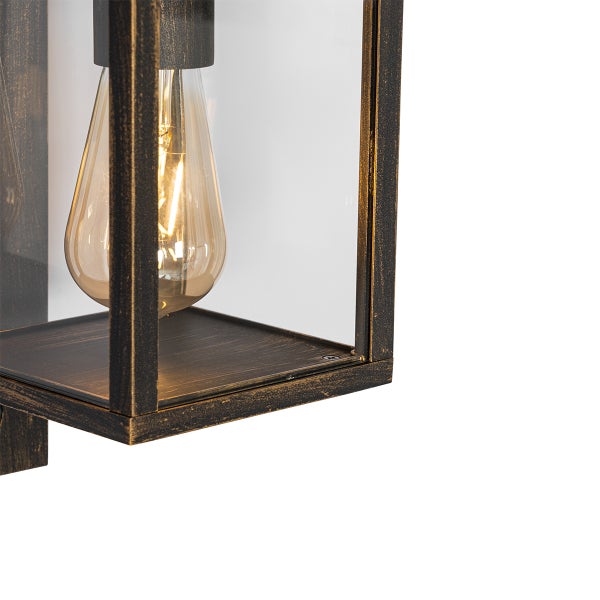 Detailaufnahme einer Außenwandleuchte mit transparentem Gehäuse und Leuchtmittel