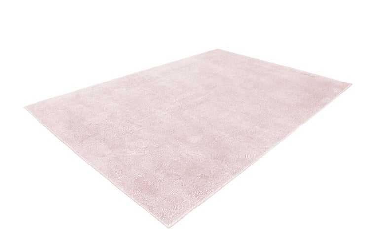 Rechteckiger rosa Hochflor-Teppich mit weicher Struktur.