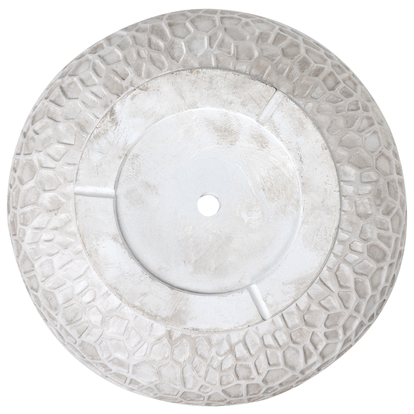 Unterseite eines runden Pflanzgefäßes mit Loch