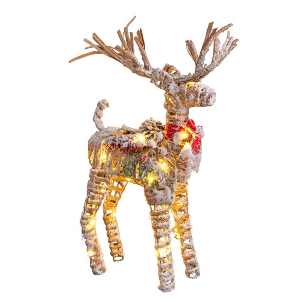 Dekorativer Hirsch aus Rattan mit Beleuchtung als Weihnachtsschmuck