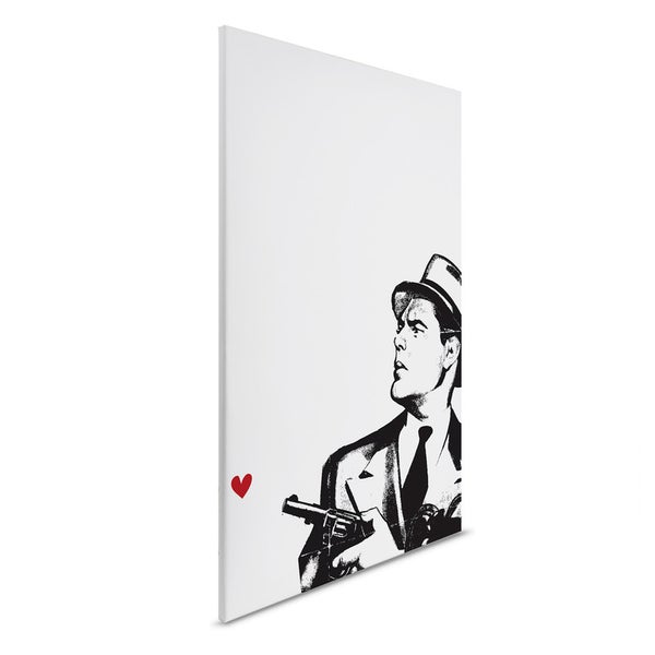 Wandbild mit einer schwarzweißen Darstellung eines Mannes mit Hut und Revolver sowie einem roten Herz