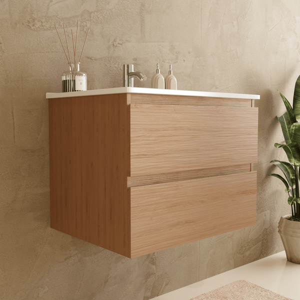 Wandhängender Waschtischunterschrank mit zwei Schubladen in Holzoptik, integriertem Waschbecken und Armatur in einem modernen Badezimmer.
