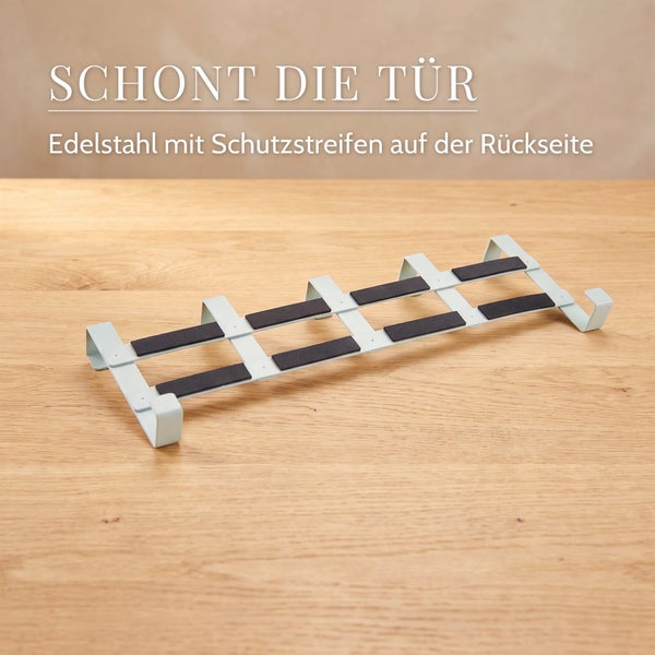 Türhakenleiste aus Edelstahl mit schützenden Streifen auf der Rückseite zum Einhängen an Türen.