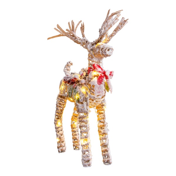 Dekorativer Hirsch mit Beleuchtung und Schleife für die Weihnachtszeit