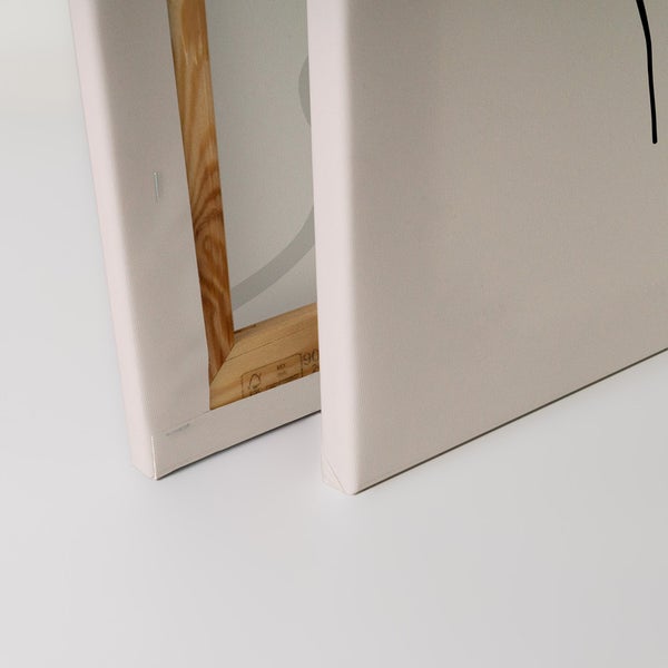 Detailansicht zweier Leinwandbilder mit Holzrahmen