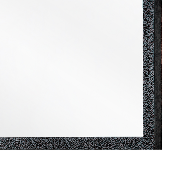 Detailaufnahme eines Spiegels mit Rahmen