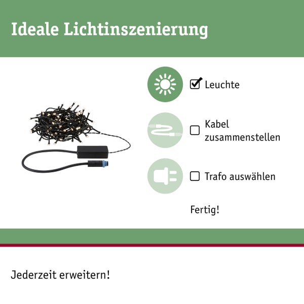 Zwei moderne Außenleuchten mit LED Technik für den Gartenpfad vor einem Wohnhaus mit Blumenbeeten und Pflasterweg.