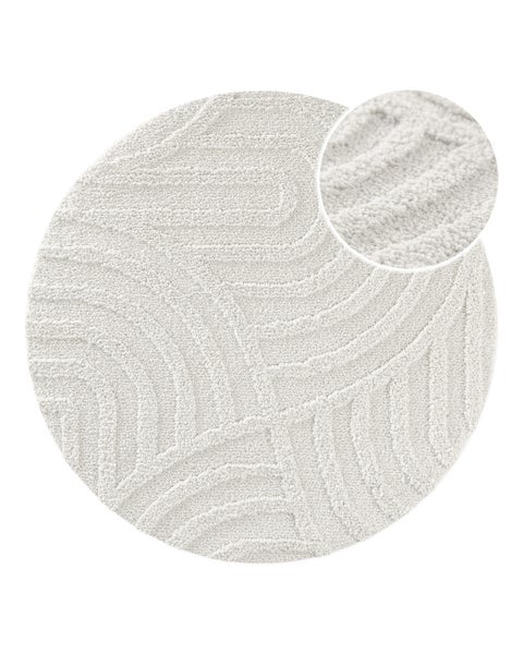 Runder Teppich mit Wellenmuster und Struktur in Beige inklusive Detailansicht der Oberfläche.