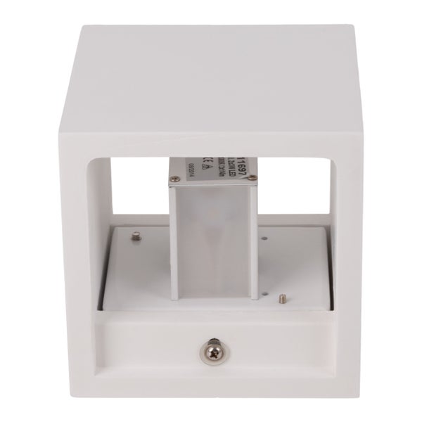 Heller Raum mit Holzdecke und eingelassenen Strahlern, ergänzt durch eine Zimmerpflanze.