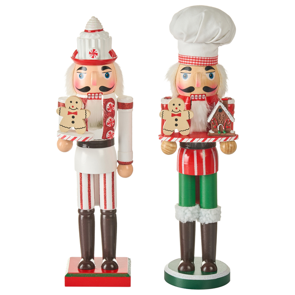 Zwei Nussknackerfiguren im Bäckerdesign mit Lebkuchenmann und Lebkuchenhaus