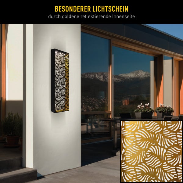 Dekorative Aussenleuchte mit goldfarbener Innenseite an einer Hauswand