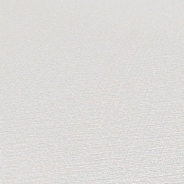 Nahaufnahme einer weißen Tapete mit feiner Textur.