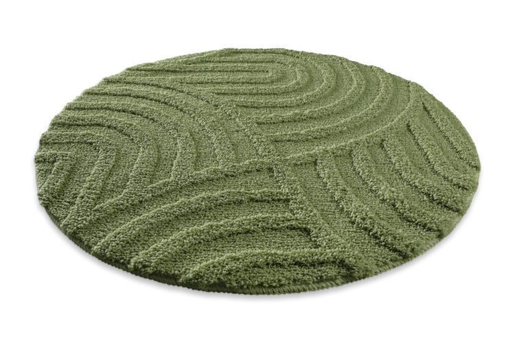 Runder Badeteppich mit Wellenstruktur in Grün aus weichem Material.