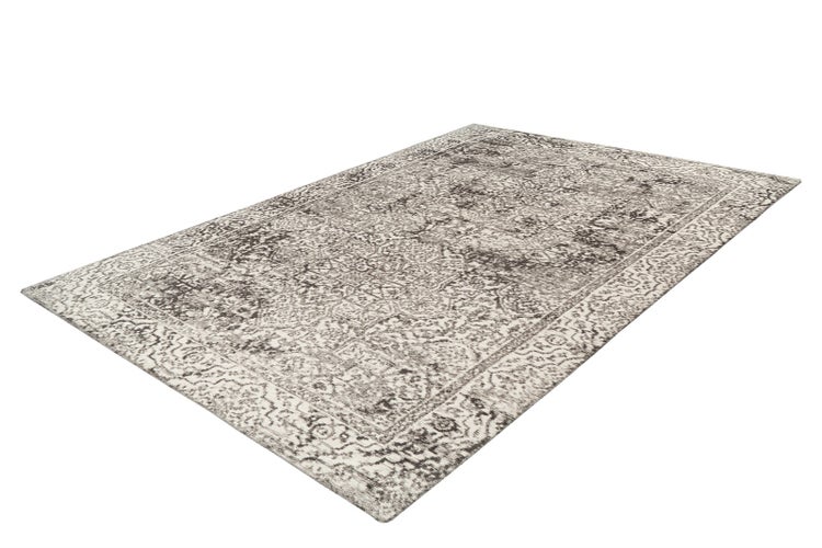 Rechteckiger Teppich mit orientalischem Vintage-Muster in Grau und Weiß.