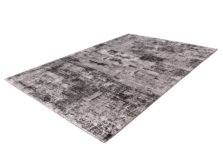 Rechteckiger Teppich mit abstraktem Vintage-Muster in Grau, Schwarz und Weiß.