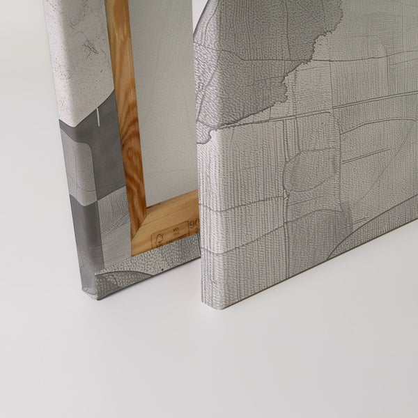 Nahaufnahme von zwei Leinwandbildern mit abstraktem Muster und Holzrahmen