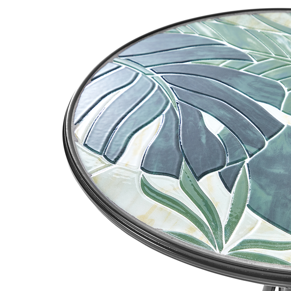 Detailansicht eines runden Beistelltisches mit Mosaik-Tischplatte im grünen Blattdesign und dunklem Metallrand.