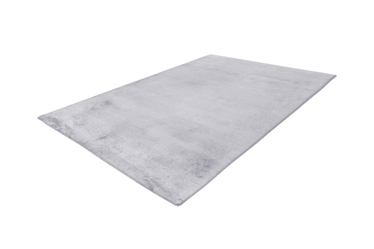 Rechteckiger Teppich in Hellgrau mit weicher, flauschiger Oberfläche.