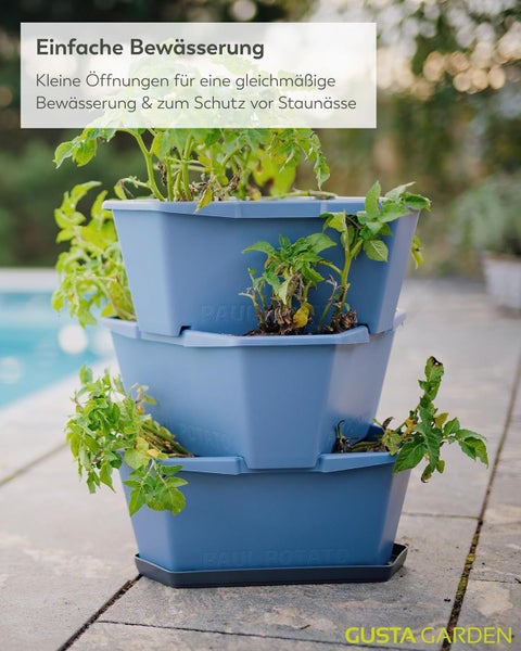 Paul Potato Kartoffelturm aus Kunststoff mit drei stapelbaren Pflanzgefäßen, Kartoffelpflanzen und Öffnungen für gleichmäßige Bewässerung.