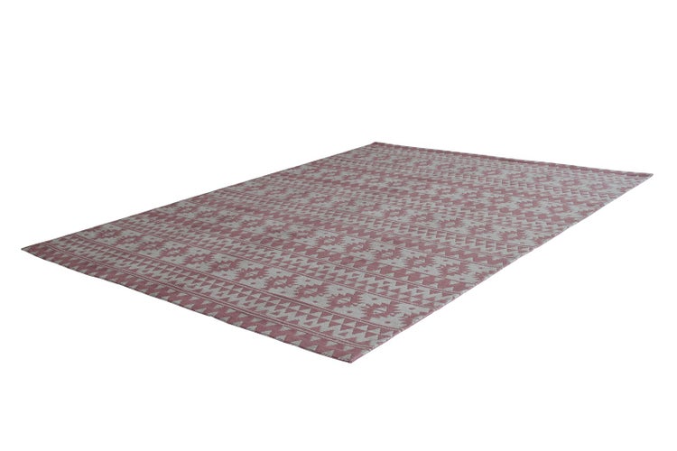 Rosa-weißer rechteckiger Teppich mit geometrischem Muster aus Dreiecksreihen und ethnischen Motiven.