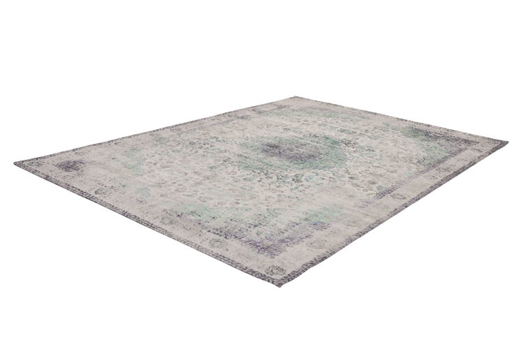 Grauer Orientteppich mit Vintage-Medaillon-Muster und abgenutzter Optik.