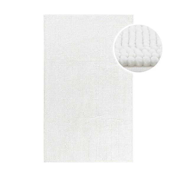 Weißer Badeteppich mit strukturierter Noppenoberfläche aus weichem Material mit Detailansicht der Textur.