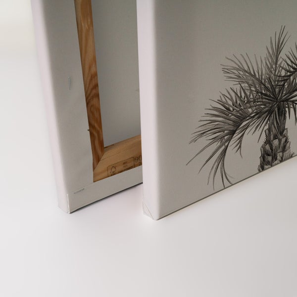 Leinwandbild mit Palmenmotiv auf einem stabilen Holzrahmen montiert.