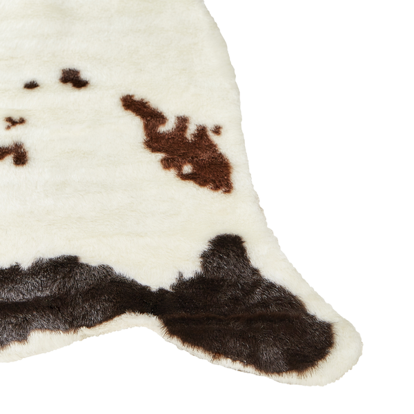 Detailansicht eines Teppichs mit Kuhfellmuster