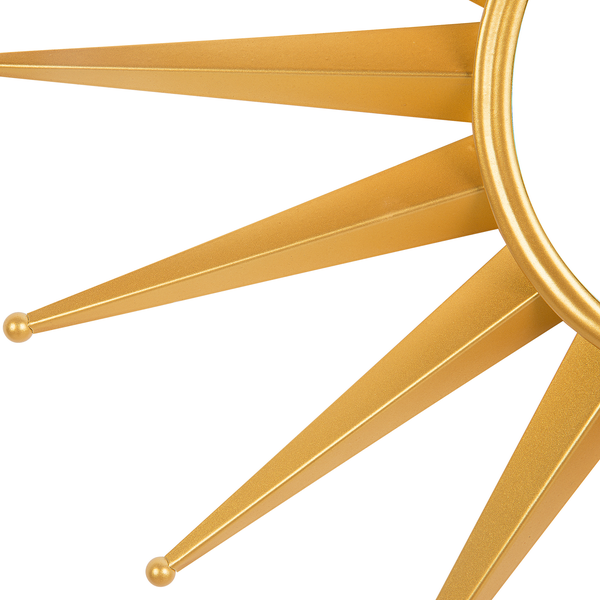 Detailansicht eines Spiegels mit Sonnenform-Design