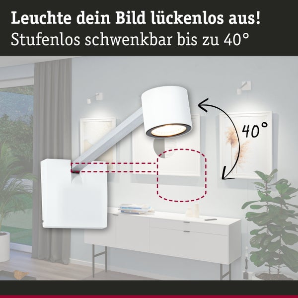 LED Bilderleuchte Adelia zur Beleuchtung eines Bildes an der Wand in einem Wohnraum.