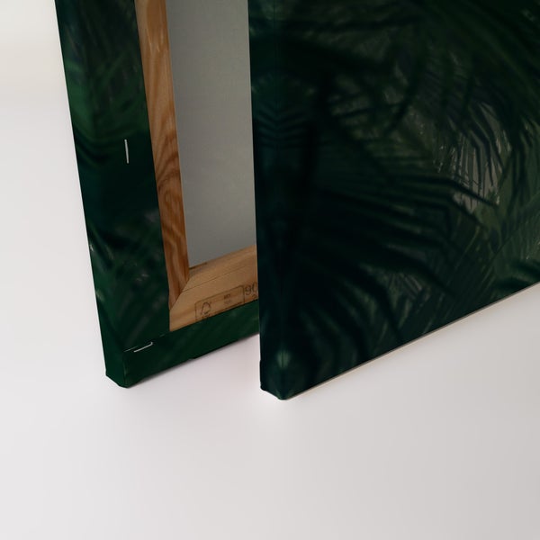 Leinwandbild mit Palmenblattmotiv auf Keilrahmen aus Holz, Rückansicht mit Details zur Rahmenkonstruktion.