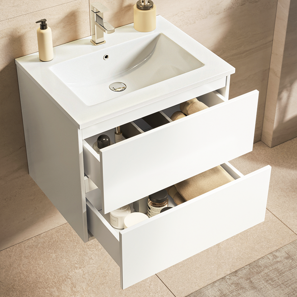 Hängender Waschtisch mit zwei Schubladen, Waschbecken und Armatur in einem modernen Badezimmer.