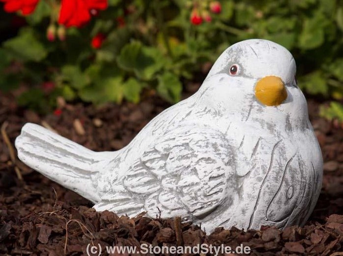 Dekorative Vogelfigur aus Steinguss für die Gartendekoration als Gartenstecker oder zur Aufstellung im Beet