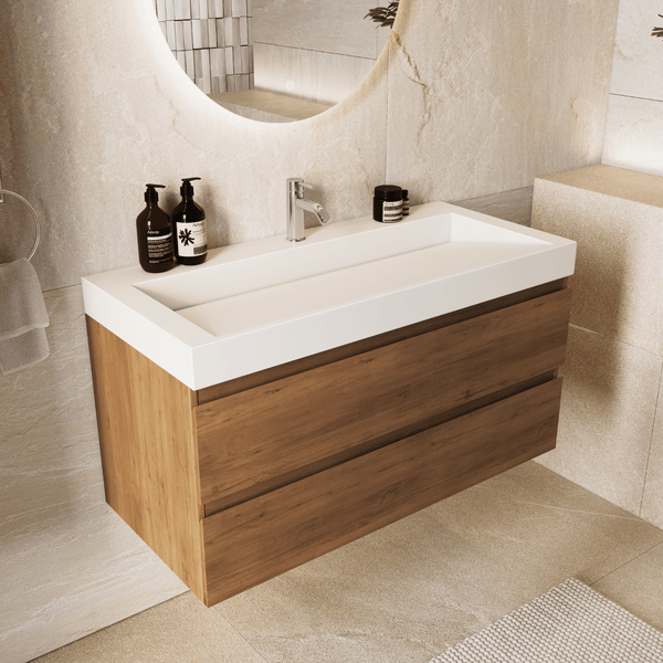 Moderner Waschtischunterschrank in Holzoptik mit weißem Waschbecken und zwei Schubladen in einem modernen Badezimmer.