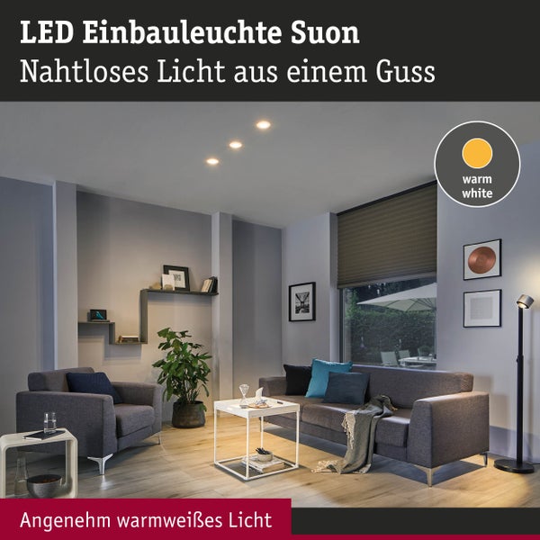 Runde schwarze LED-Deckenleuchte mit konzentrischen Leuchtringen an einer weißen Decke installiert.