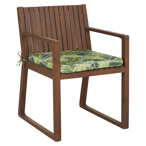 Holzstuhl mit Armlehnen und Sitzkissen mit Pflanzenmuster