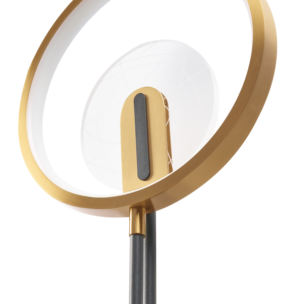 Moderne Stehlampe mit kreisförmigem Lampenschirm und grafischem Muster