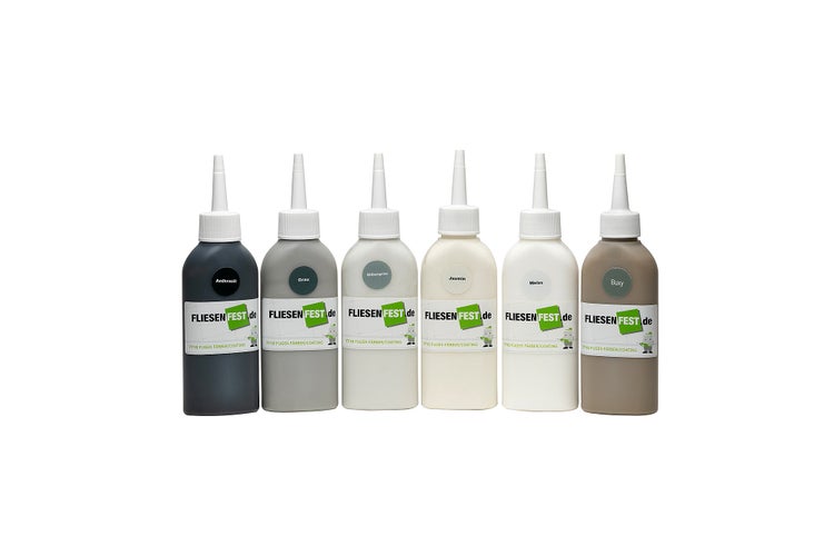Sechs Flaschen Fliesenfest Fugenfarbe und Beschichtung zur Renovierung von Fliesenfugen in verschiedenen Farbtönen.