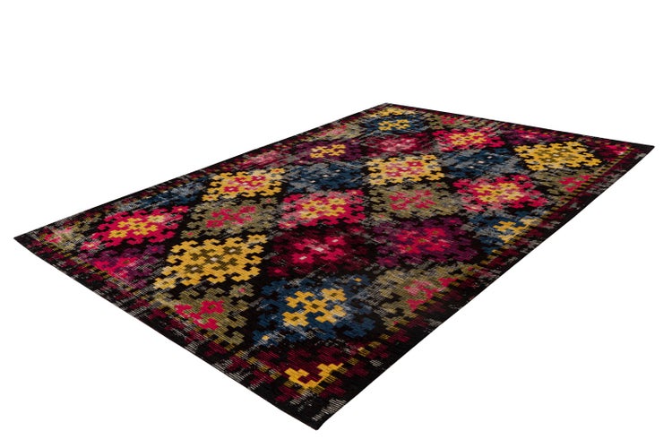 Rechteckiger Webteppich mit geometrischem Muster aus kleinen Quadraten.