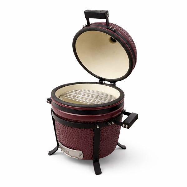 Keramikgrill mit geöffnetem Deckel und Grillrost