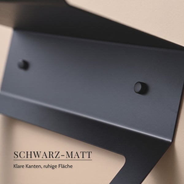 Wandregal aus Metall in minimalistischem Design mit klarer Kantenführung und matter Oberfläche.