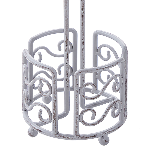 Toilettenpapierhalter aus Metall mit dekorativen Ornamenten im Landhausstil.