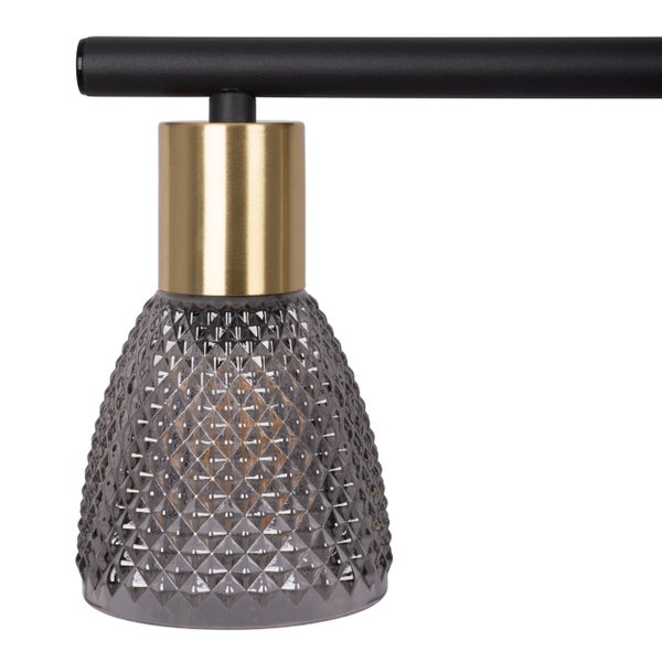 Detailaufnahme einer Deckenleuchte mit gemusterter Glasabdeckung