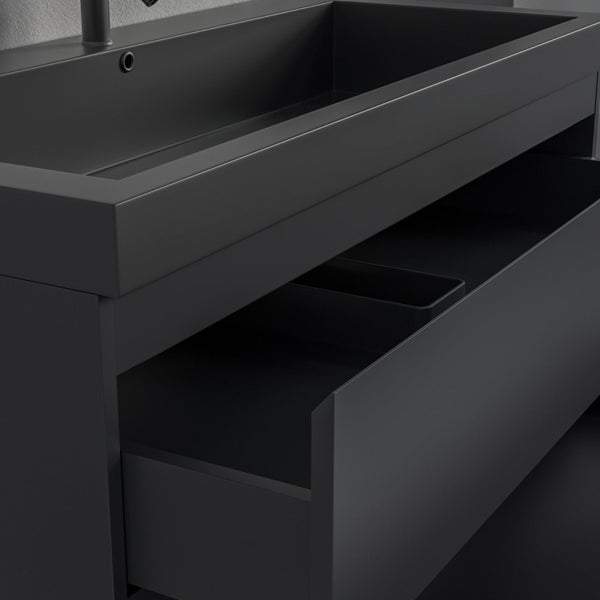Moderner Waschtischunterschrank mit integriertem Waschbecken und einer geöffneten Schublade.