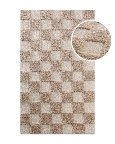 Rechteckiger Hochflor-Teppich in Olivgrün mit weicher Oberfläche.