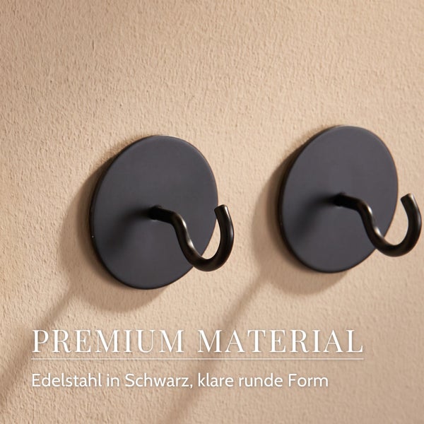 Zwei runde Wandhaken aus Edelstahl mit Haken in minimalistischer runder Form zur Wandmontage.