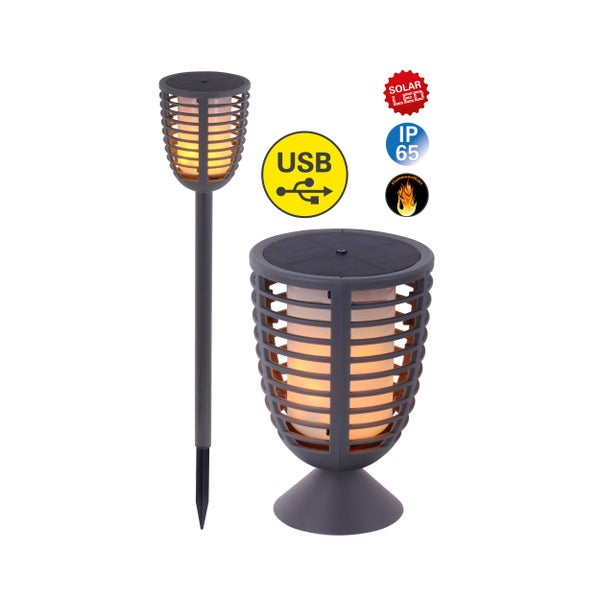 Garten mit dekorativen Solarleuchten, Tisch und Stuhl